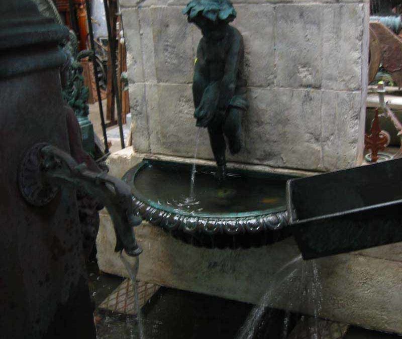 French wall fountain with boy riding fish and bronze half bowl